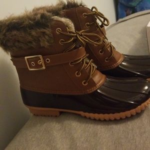 Two toned, fur lined duck books